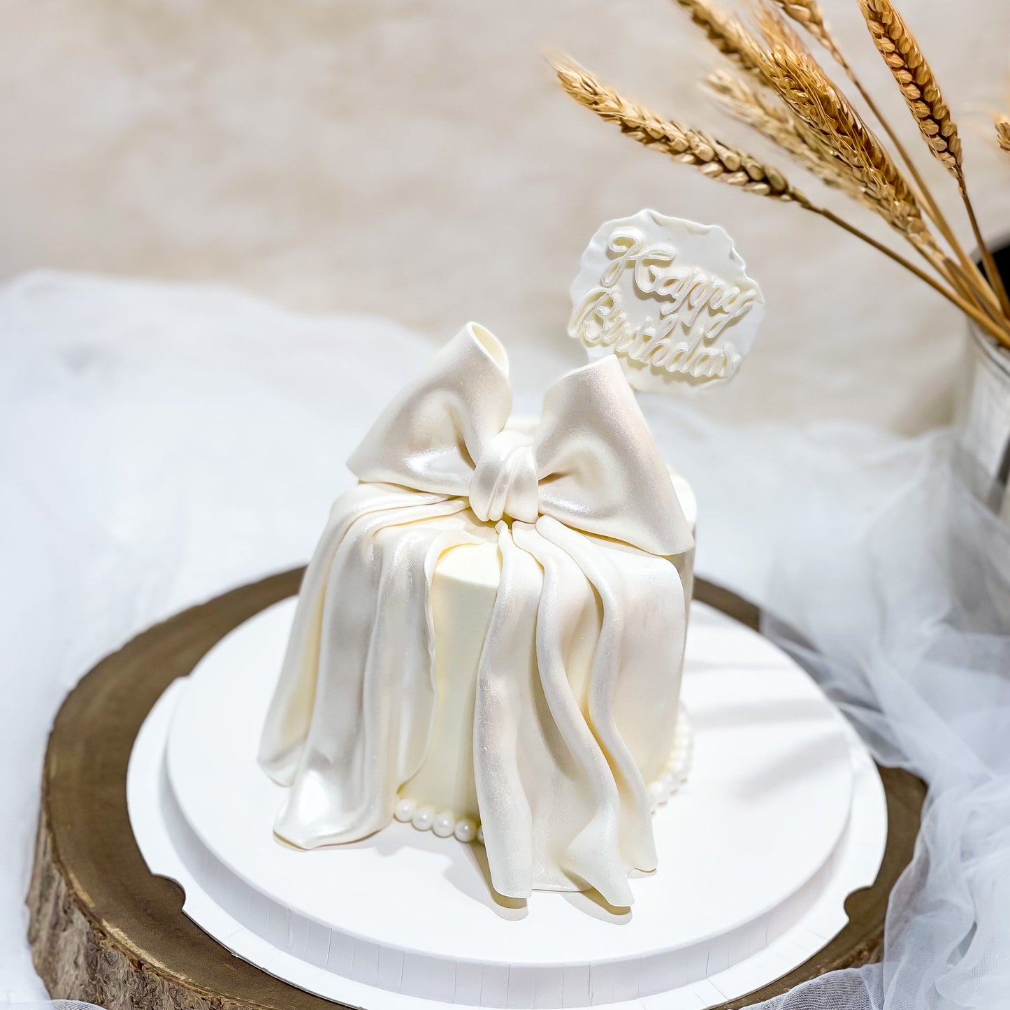 Ribbon Cake: Elegance in White